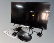 A JVC 24" LED smart TV with remote and One For All aerial.