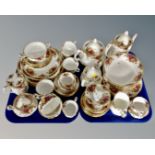 A collection of approximately 60 pieces of Royal Albert Old Country Roses tea,