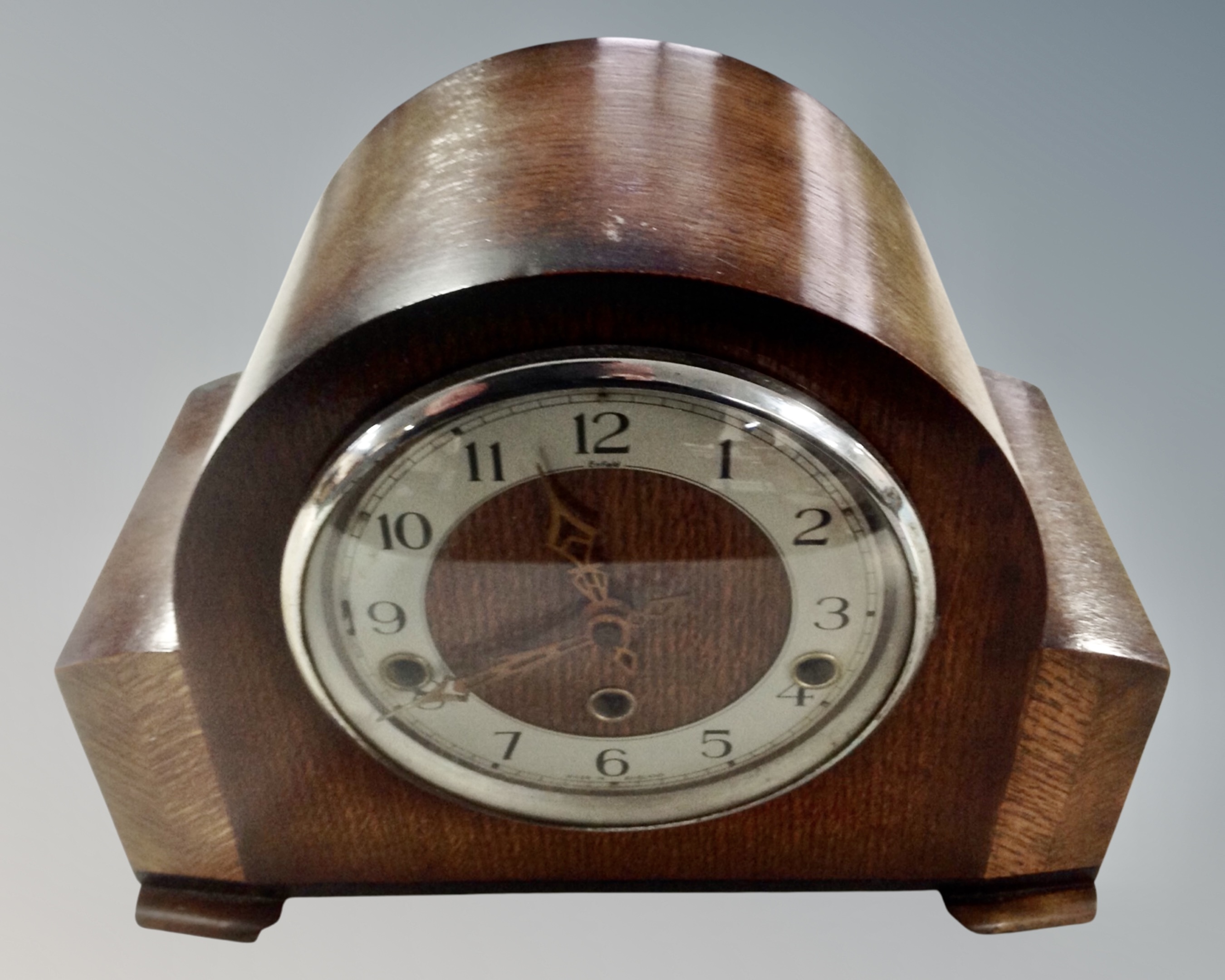 A 20th century oak cased Smiths Enfield mantel clock.