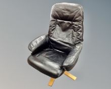 A black swivel relaxer armchair.