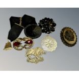 A collection of antique jewellery including mother of pearl, bog oak etc.