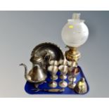 A tray containing a stainless steel bowl on stand, brass Buddha figure,