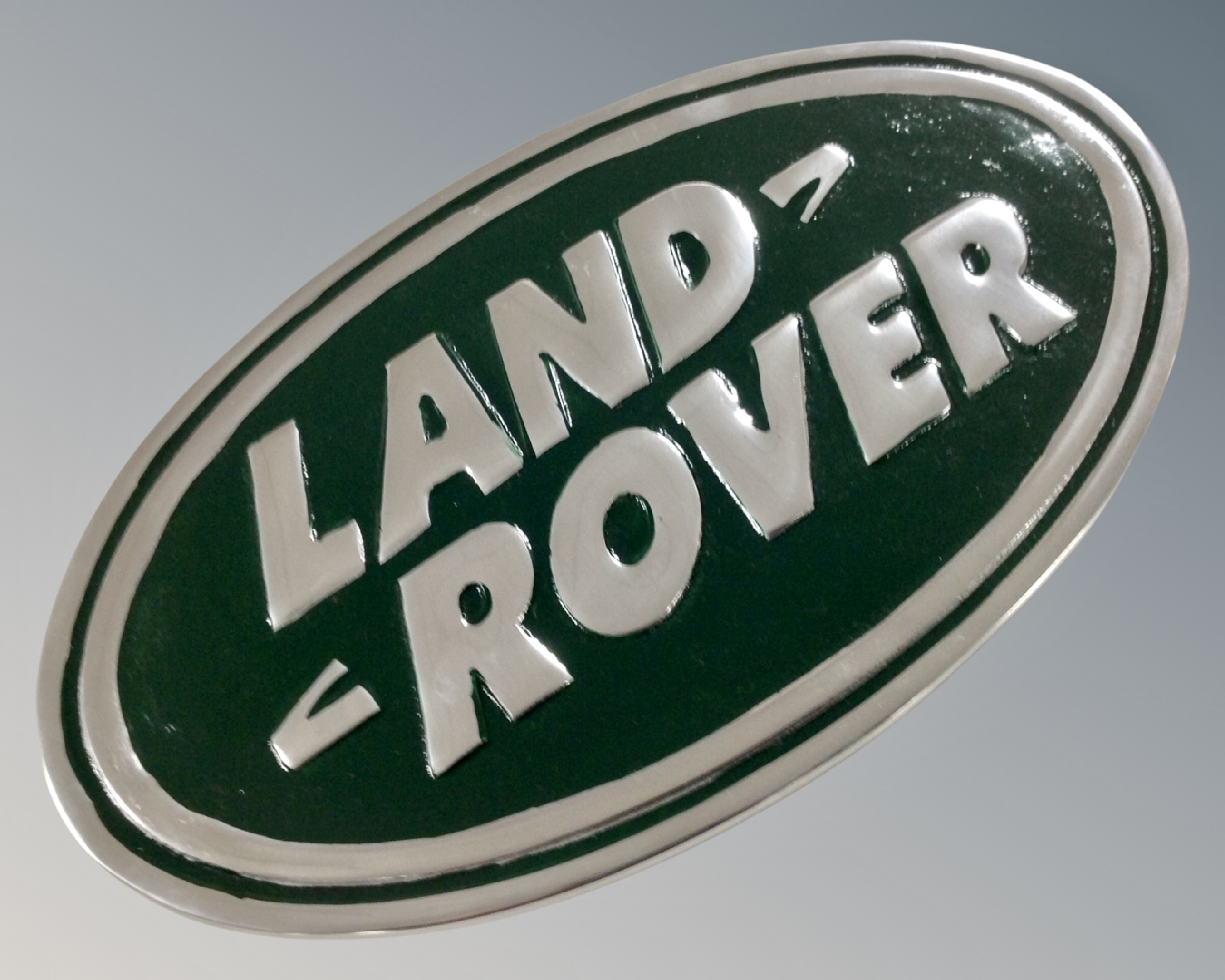 An aluminium Land Rover wall plaque.
