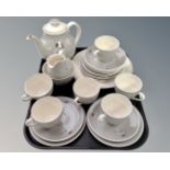 A tray containing a 24 piece Royal Doulton Forest Pine china tea service.