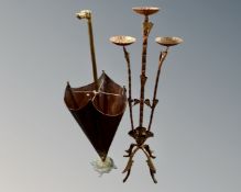 A brass dog's head stick pot in the form of an umbrella together with a metal three way