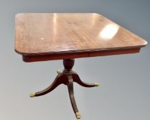 A Regency style pedestal dining table (width 95cm)