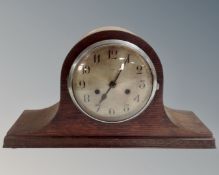 An oak cased Enfield eight day mantel clock with silvered dial