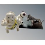 Two cast iron figures, Michelin Man and HMV Nipper.