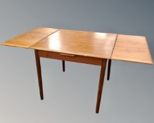 A mid-20th century Scandinavian teak square extending dining table (length 157cm)