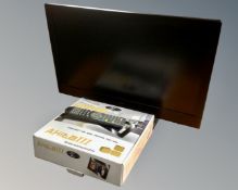 A Bush 24" LED TV/DVD with remote together with an Akita III professional 7" digital multimedia