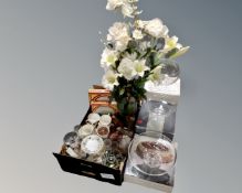 A box containing assorted glassware, artificial flowers, tea china,
