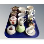 A tray containing assorted ceramics including commemorative tankards and mugs,