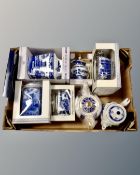 A box containing boxed and unboxed Ringtons ceramics including vases, willow pattern jug,