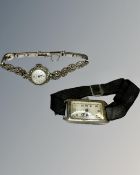 A vintage silver watch together with a silver marcasite watch.