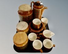 A Hornsea Bronte 17 piece coffee service together with three matching storage jars with lids.