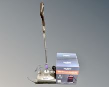 A Bacoeng ash vacuum, boxed as new, together with a Gtech electric cordless carpet sweeper.