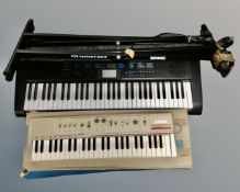 A Casio CTK-1200 electric keyboard with lead on stand and a Casiotone MT-46 keyboard (boxed)