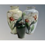 A Japanese green cloisonne vase, height 9 cm and two further vases decorated with flowers, 18.