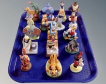 A tray containing seventeen assorted Disney figures.
