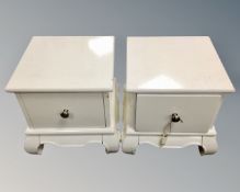 A pair of painted low bedside stands fitted with drawers (width 35cm)