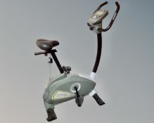 A Kettler Axos exercise bike, with lead. CONDITION REPORT: Continental wiring.