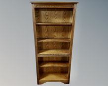 An Old Charm oak open bookcase (width 76cm)