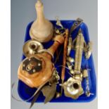 A tray containing assorted metal wares including a brass cannon, ornaments, candlesticks,