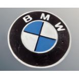 A cast iron BMW wall plaque.