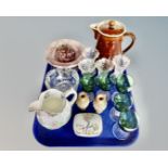 A tray containing French porcelain lidded trinket pots, a pair of miniature Doulton Lambeth vases,