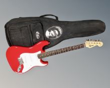 A Squier Strat electric guitar by Fender,