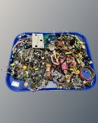 A tray of costume jewellery, bangles,