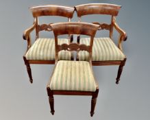A pair of 19th century mahogany Regency style scroll armchairs together with a further matching