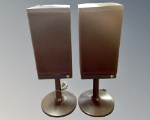 A pair of Kef Celeste IV speakers on stands,