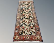 A Persian runner with Abusson central field 94 cm x 234 cm