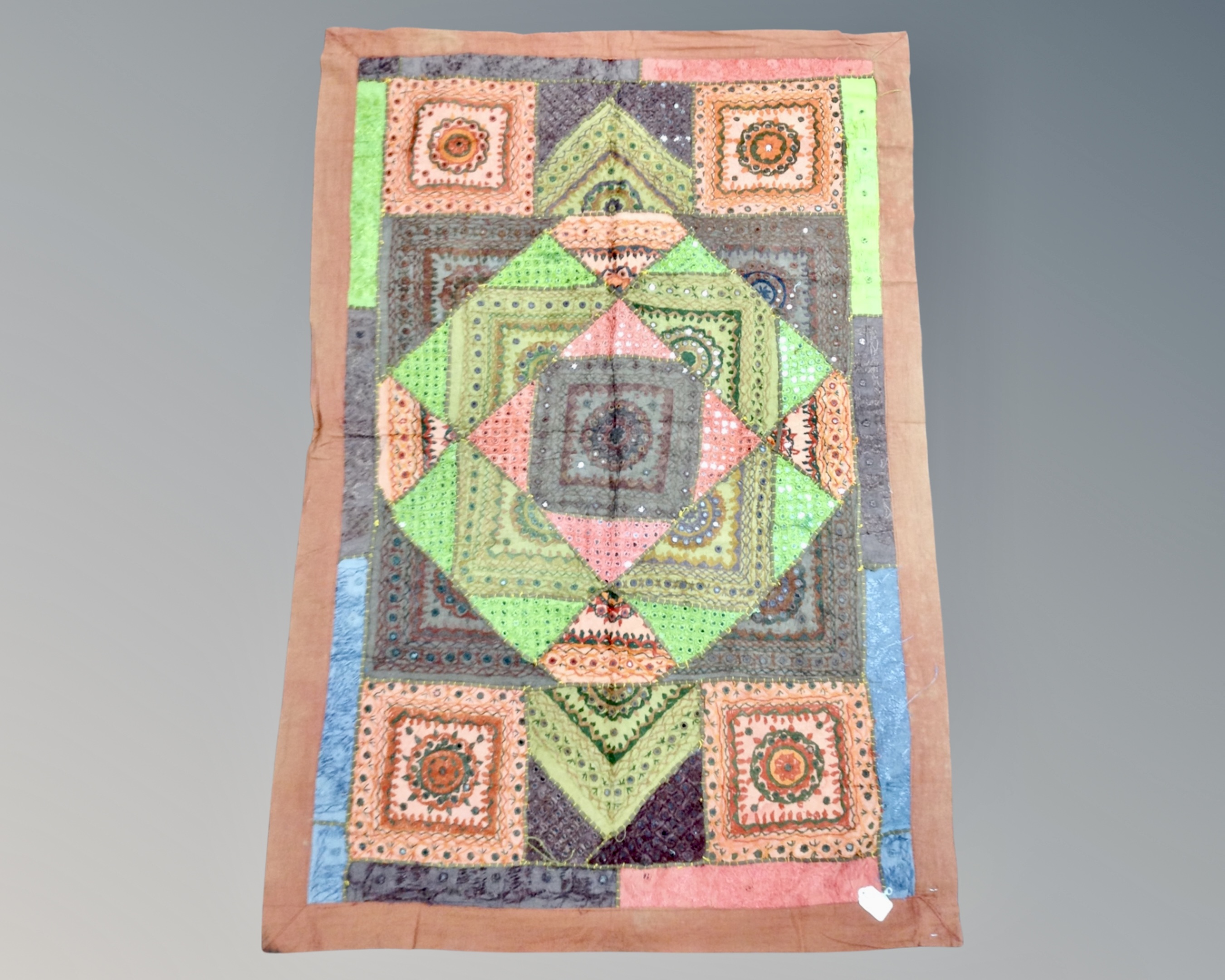 An eastern patchwork wall hanging,