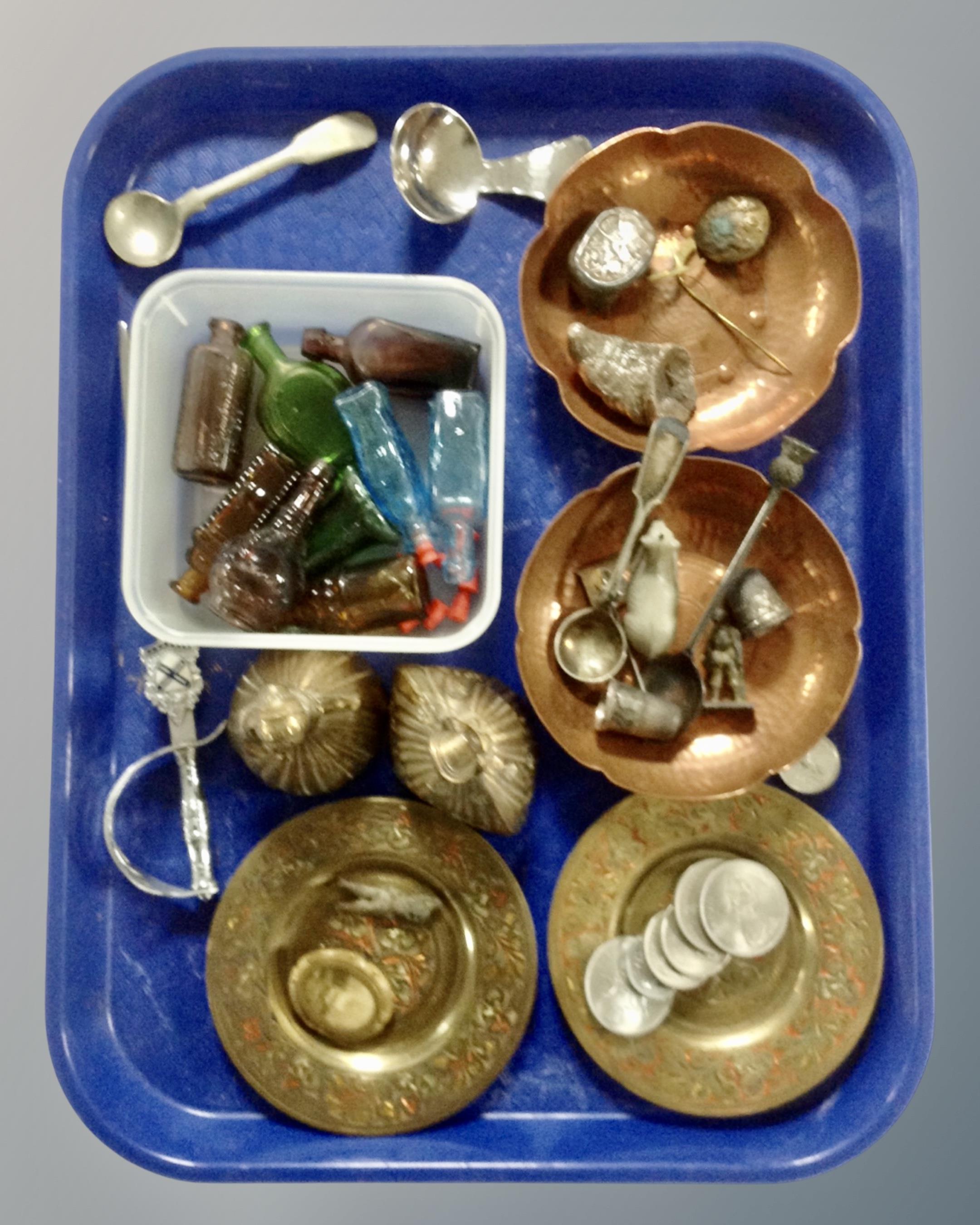 A tray containing a pair of copper scallop edge dishes, a pair of miniature eastern brass plates,