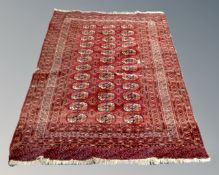 A Tekke rug, Afghanistan, 180cm by 125cm (a/f) CONDITION REPORT: Split to centre.