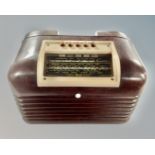 A vintage Bush Bakelite cased radio.