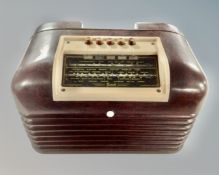 A vintage Bush Bakelite cased radio.