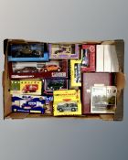A box containing a quantity of boxed die cast cars including Vanguards, Shell Sports cars,