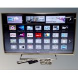 A Panasonic Viera 47" 3D LED smart TV with two pairs of 3D glasses and two remotes.