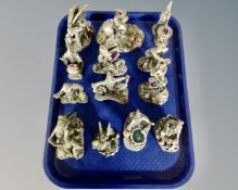 A tray containing 13 pewter figures with crystals including The Visionary, The Awakening,