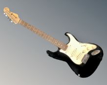 A Sunn Mustang by Fender electric guitar.