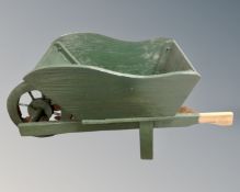 A painted wooden wheelbarrow (length 69cm)
