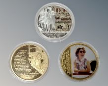 Three gold plated commemorative coins