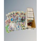 A box containing a large collection of 1990s and later Marvel Spider-Man comics including various
