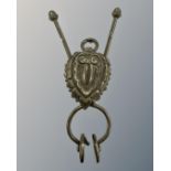A Victorian electroplated skirt lifter, length 14 cm.