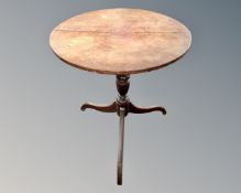 A 19th century circular pedestal occasional table.