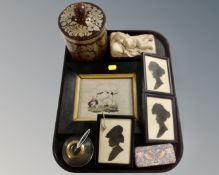 A tray containing three 19th century silhouette portraits, glass match striker,