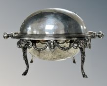 A 19th century silver plated dome topped breakfast dish raised on hoof legs with rams head